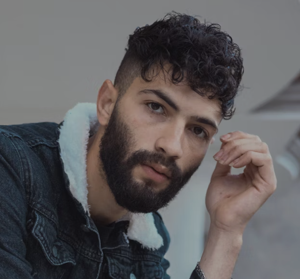 Bearded man in denim jacket